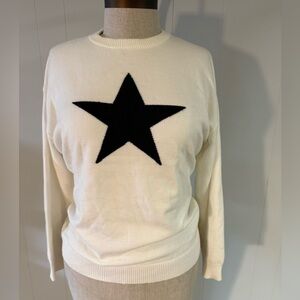 Elegant Cream Sweater with Black Star Design